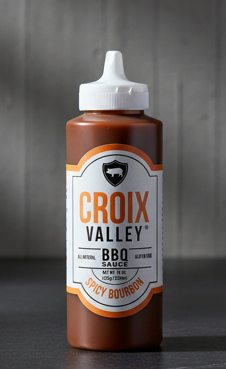 Bottle of Croix Valley Spicy Bourbon BBQ Sauce on a white background