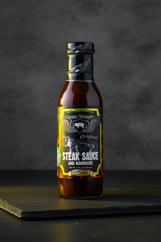 Bottle of Crenshaw Valley Steak Sauce and Marinade on a black background